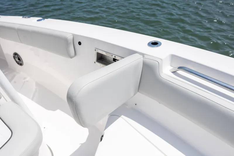 Slide: The Image of 2022 Sea Fox 228 Commander boat interior with cushioned seating and ocean view. - 16