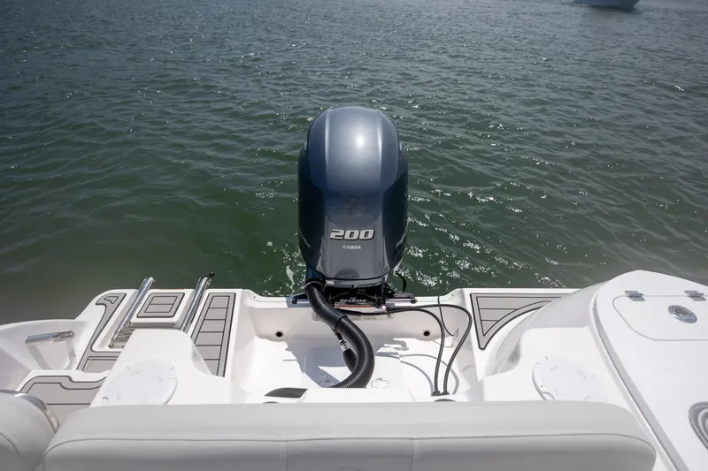 Slide: The Image of 2022 Sea Fox 228 Commander boat with Yamaha 200 engine on water. - 28