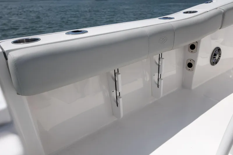 Slide: The Image of 2022 Sea Fox 228 Commander boat interior with rod holders and cup holders. - 32