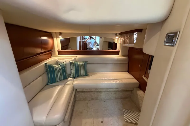 Slide: The Image of Luxurious interior of 2007 Sea Ray 44 Sundancer yacht with plush seating and elegant decor. - 24