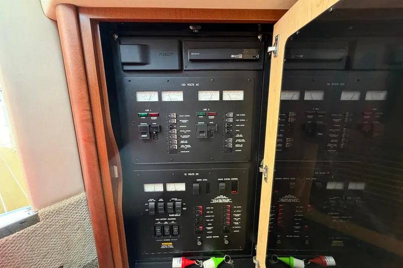 Slide: The Image of Electrical control panel inside a 2007 Sea Ray 44 Sundancer yacht. - 27