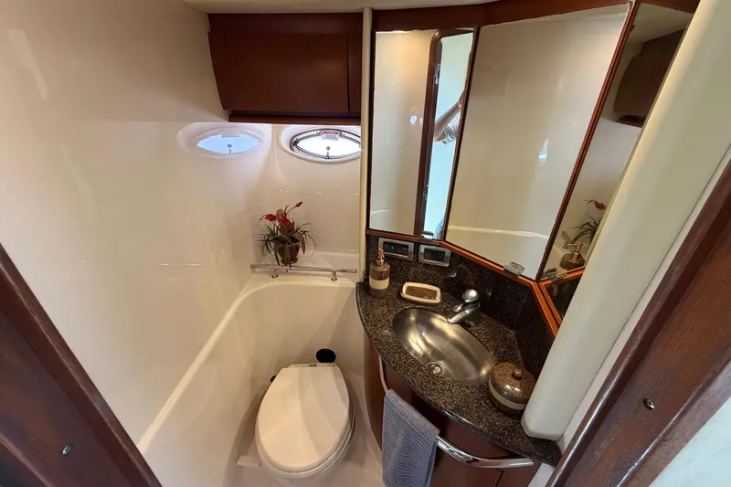 Slide: The Image of Luxurious bathroom in 2007 Sea Ray 44 Sundancer yacht with modern fixtures and elegant design. - 30