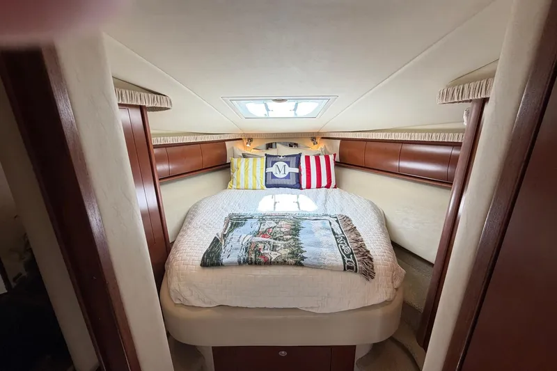 Slide: The Image of Luxurious cabin interior of 2007 Sea Ray 44 Sundancer yacht with cozy bedding. - 31