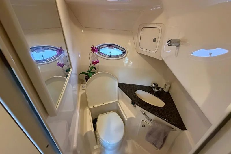 Slide: The Image of Luxurious bathroom in 2007 Sea Ray 44 Sundancer yacht with elegant fixtures and floral decor. - 33