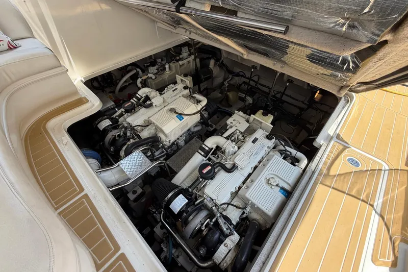 Slide: The Image of Engine compartment of a 2007 Sea Ray 44 Sundancer yacht, showcasing dual engines. - 35