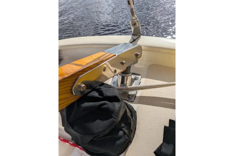 Slide: The Image of Close-up of a 1978 Hallberg-Rassy Monsun 31 sailboat's tiller and rigging. - 32