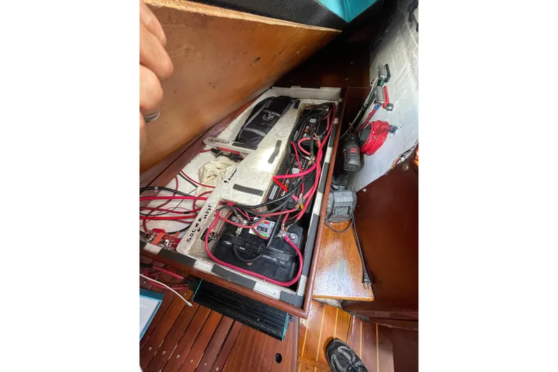 Slide: The Image of Electrical system of a 1987 Hallberg-Rassy Monsun 31 sailboat, featuring wiring and components. - 25
