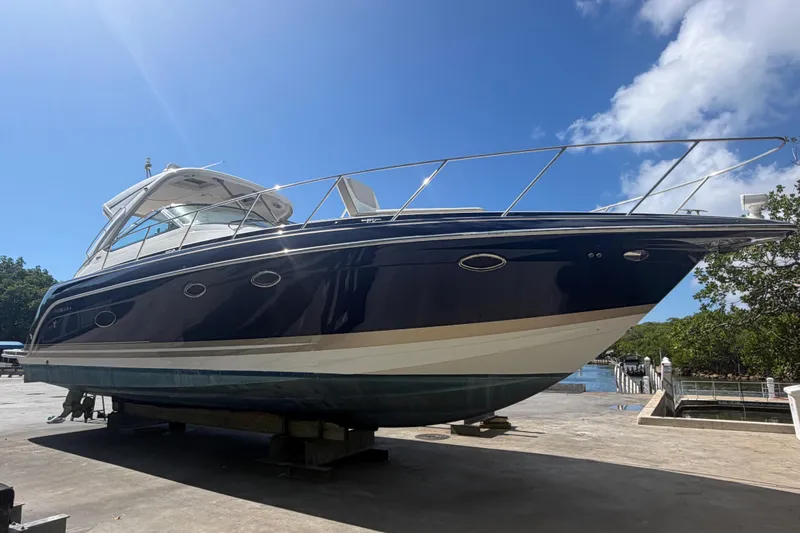 The Image of 2016 Formula 40 Performance Cruiser on dry dock under clear blue sky. - 0