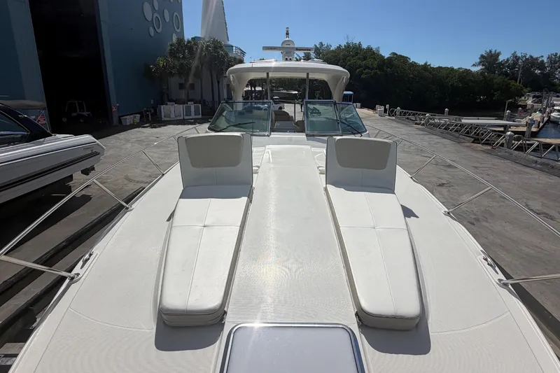 Slide: The Image of 2016 Formula 40 Performance Cruiser docked near marina with clear blue sky. - 12
