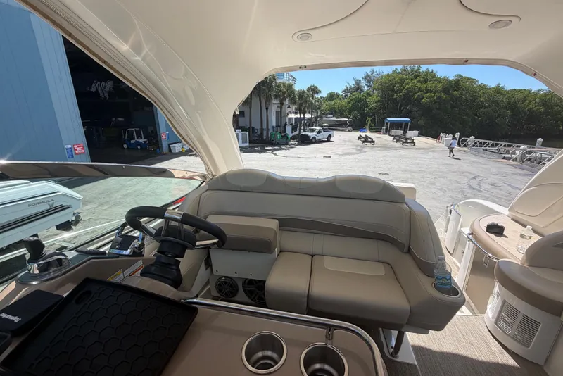 Slide: The Image of Interior view of 2016 Performance Cruiser Formula 40 yacht, featuring helm and seating area. - 17