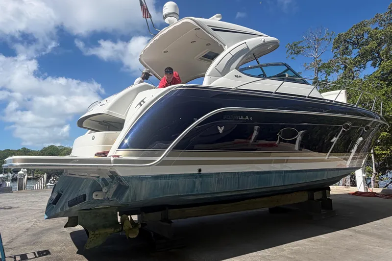 Slide: The Image of 2016 Formula 40 Performance Cruiser on dry dock under clear blue sky. - 2