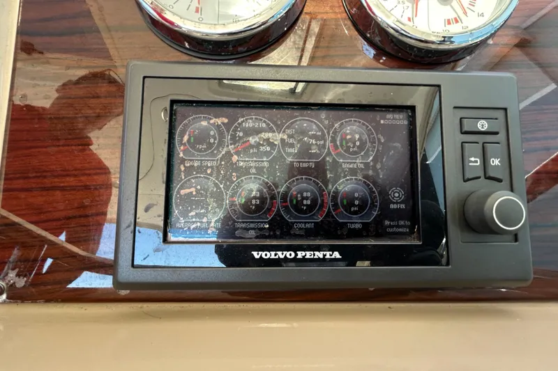 Slide: The Image of Volvo Penta control panel on 2016 Performance Cruiser Formula 40 dashboard. - 23