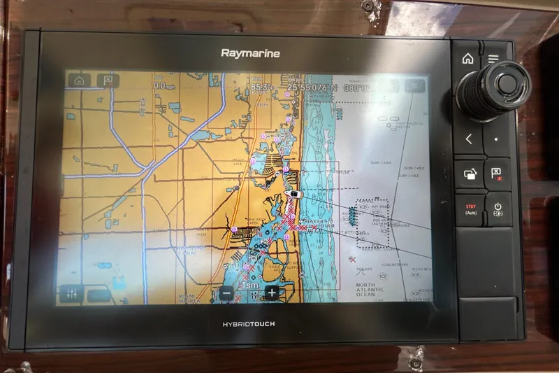 Slide: The Image of Raymarine navigation display on 2016 Performance Cruiser Formula 40, showing nautical chart and controls. - 24