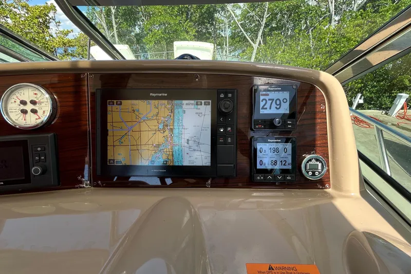Slide: The Image of Dashboard of a 2016 Performance Cruiser Formula 40 with navigation system and compass. - 25