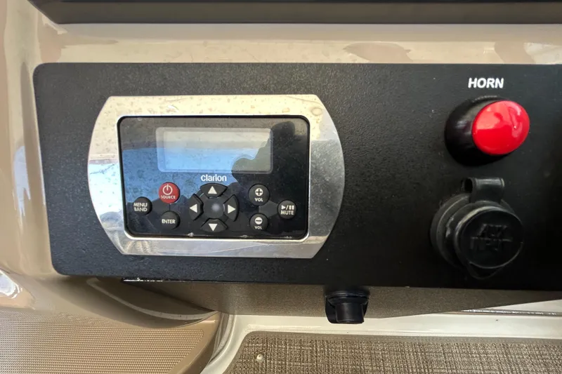 Slide: The Image of Control panel of a 2016 Performance Cruiser Formula 40 with Clarion audio system. - 28