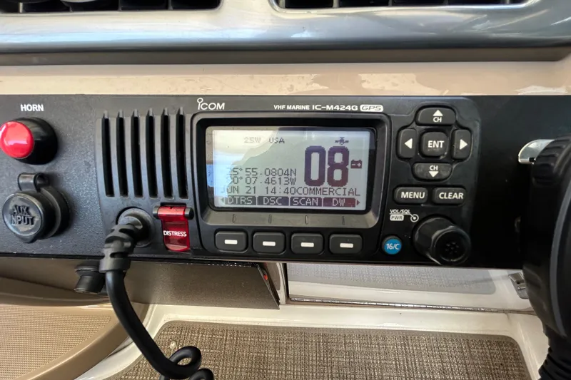 Slide: The Image of VHF marine radio on 2016 Performance Cruiser Formula 40, displaying channel and coordinates. - 29