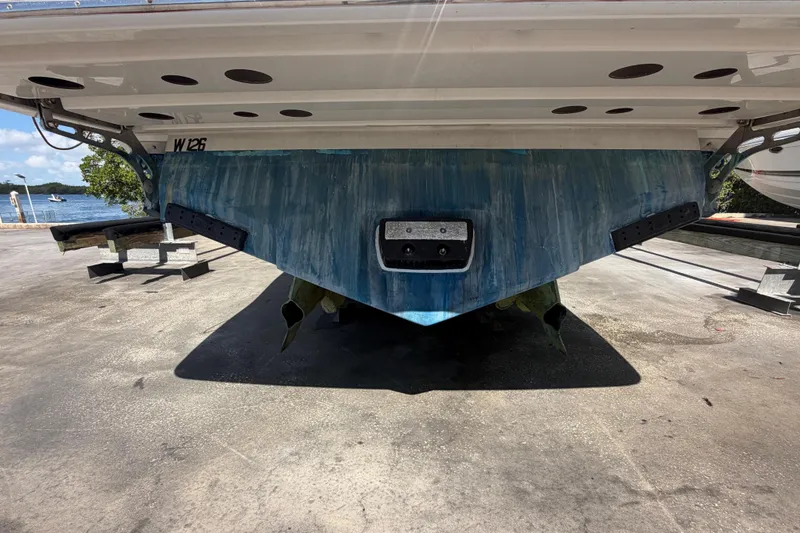 Slide: The Image of Rear view of a 2016 Performance Cruiser Formula 40 boat on a dry dock. - 3