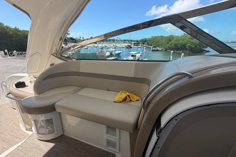 Slide: The Image of Interior view of a 2016 Formula 40 Performance Cruiser yacht with marina backdrop. - 37