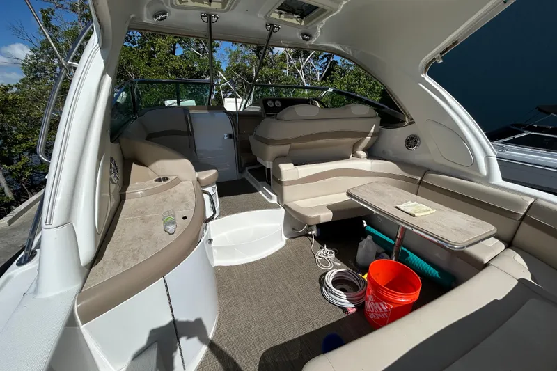 Slide: The Image of 2016 Performance Cruiser Formula 40 interior with seating, table, and modern amenities. - 41
