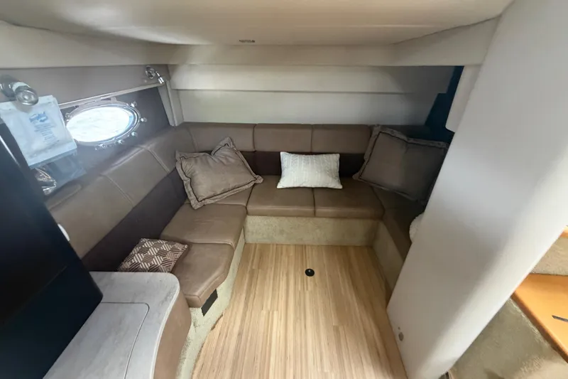Slide: The Image of Interior of 2016 Performance Cruiser Formula 40 with cozy seating and cushions. - 47