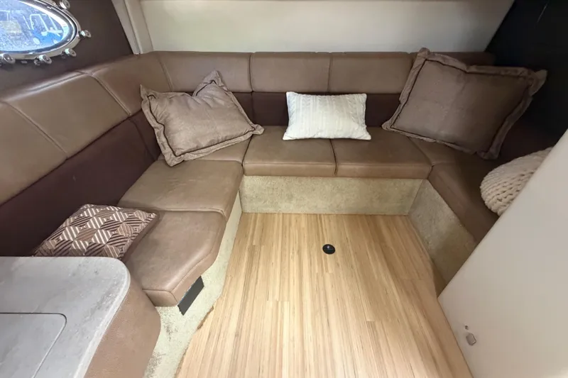 Slide: The Image of Interior of 2016 Formula 40 Performance Cruiser with brown leather seating and decorative pillows. - 48
