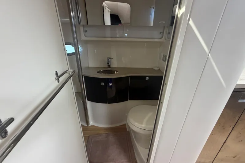 Slide: The Image of Modern bathroom interior of 2016 Performance Cruiser Formula 40 yacht, featuring sleek fixtures and compact design. - 57
