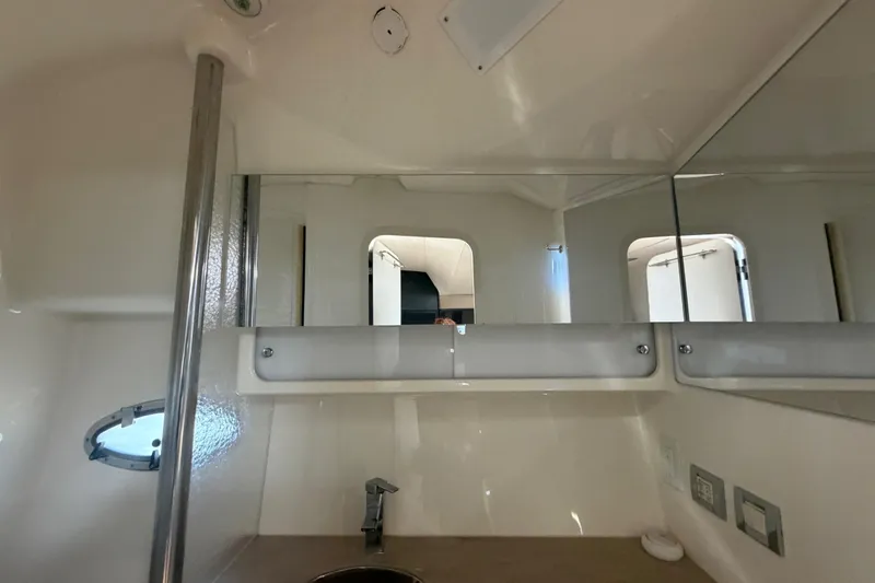 Slide: The Image of Interior of 2016 Formula 40 Performance Cruiser bathroom with mirror and sink. - 59