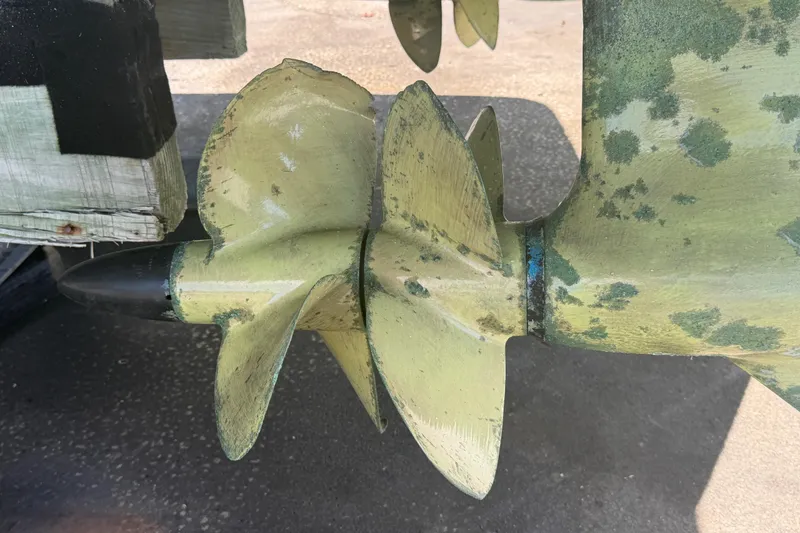 Slide: The Image of Close-up of a 2016 Formula 40 Performance Cruiser propeller with visible wear and marine growth. - 6