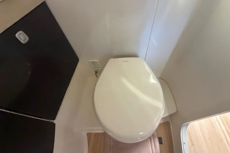 Slide: The Image of 2016 Performance Cruiser Formula 40 bathroom with modern toilet and sleek design. - 60