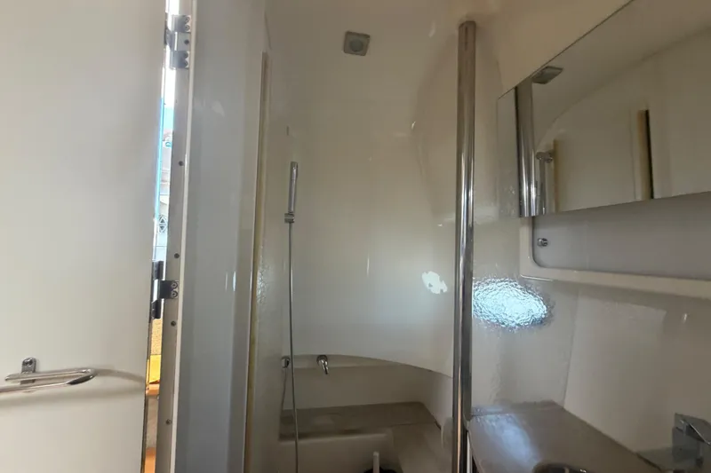 Slide: The Image of Interior of 2016 Formula 40 Performance Cruiser bathroom with shower and mirror. - 62