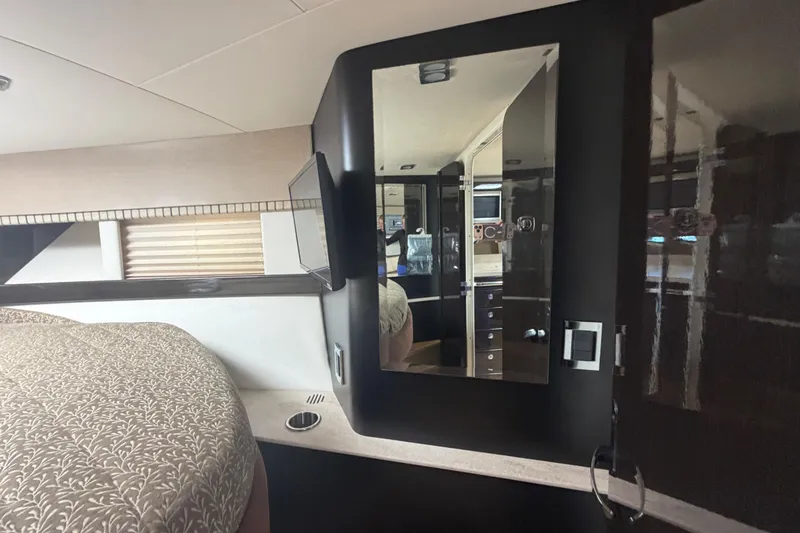 Slide: The Image of Interior of a 2016 Performance Cruiser Formula 40, featuring a mirror and elegant decor. - 65