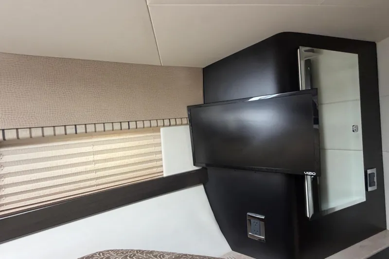 Slide: The Image of Interior of 2016 Performance Cruiser Formula 40 with TV and modern design elements. - 66