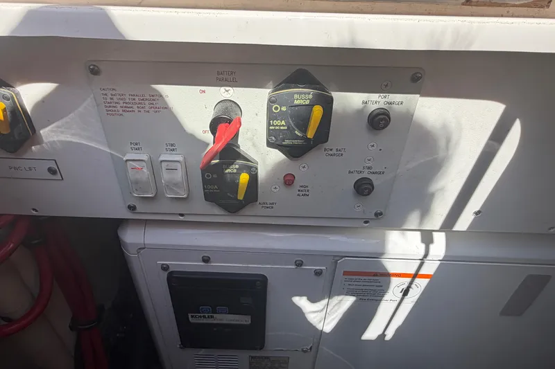 Slide: The Image of Control panel of a 2016 Performance Cruiser Formula 40, featuring battery switches and indicators. - 71