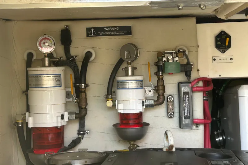Slide: The Image of Engine room of 2016 Performance Cruiser Formula 40 with fuel filters and gauges. - 73