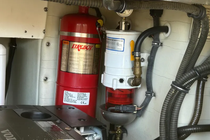 Slide: The Image of Engine room of 2016 Performance Cruiser Formula 40 with fire extinguisher and fuel filter system. - 76