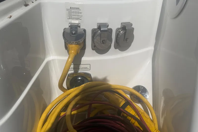 Slide: The Image of Power connections on a 2016 Performance Cruiser Formula 40 boat, featuring yellow cables. - 85