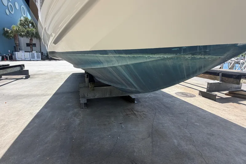 Slide: The Image of 2016 Formula 40 Performance Cruiser hull on dry dock, showcasing sleek design. - 86