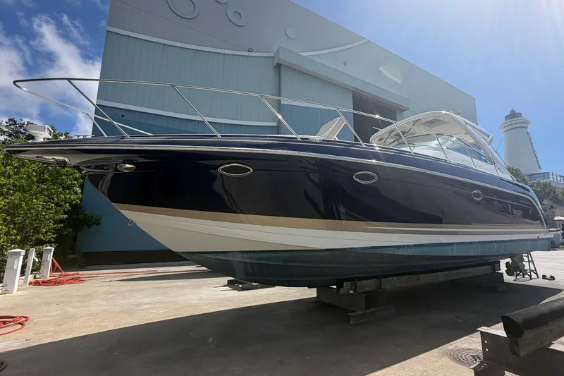 Slide: The Image of 2016 Performance Cruiser Formula 40 boat docked outdoors under clear blue sky. - 9