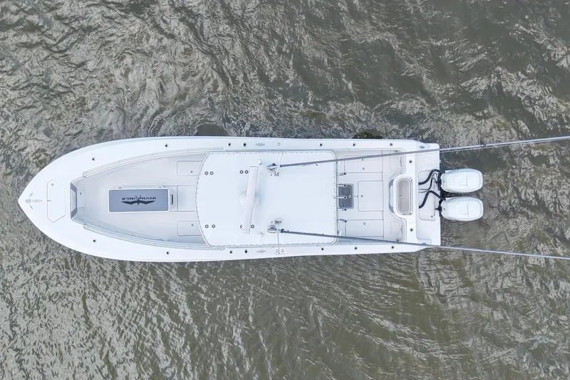 Slide: The Image of Aerial view of 2008 Invincible 33 Open Fisherman boat on water. - 13