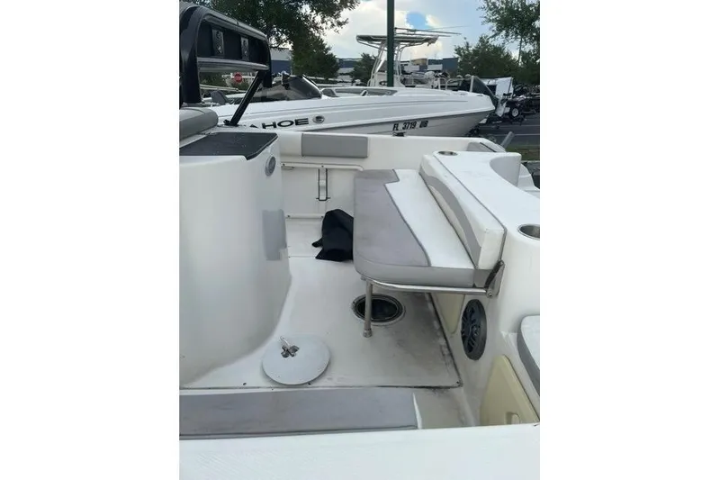 Slide: The Image of 2024 Key Largo 2100 CCW boat interior with seating and storage compartments. - 4
