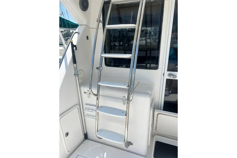 Slide: The Image of Stainless steel ladder on 2007 Riviera 33 Flybridge yacht. - 36