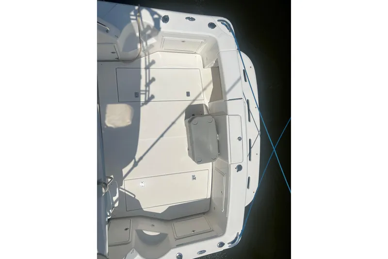 Slide: The Image of 2007 Riviera 33 Flybridge boat deck with seating and storage compartments. - 51