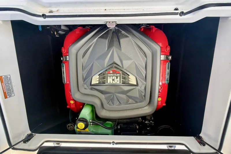 Slide: The Image of 2024 Nautique Super Air Nautique GS20 engine compartment with PCM engine visible. - 30