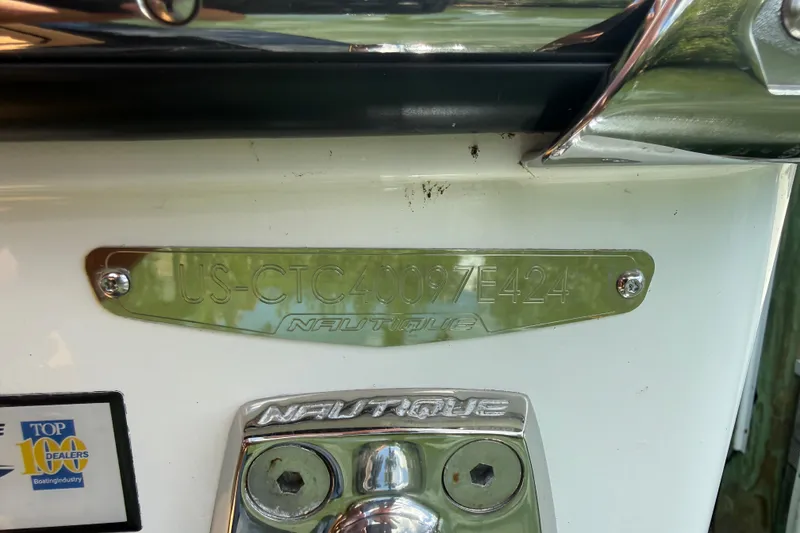 Slide: The Image of 2024 Nautique Super Air Nautique GS20 hull identification plate and branding details. - 31
