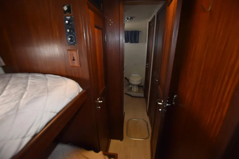 Slide: The Image of Interior of 1983 Hatteras 50 Convertible yacht showing cabin and bathroom. - 20