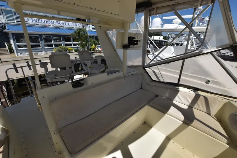 Slide: The Image of Interior view of 1983 Hatteras 50 Convertible yacht at dockside near Freedom Boat Club. - 5