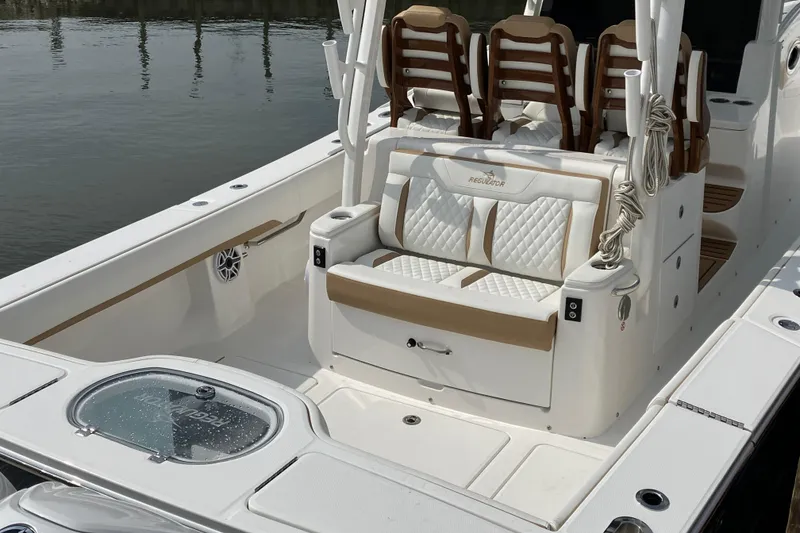 Slide: The Image of 2027 Regulator 35 boat interior with luxurious seating and modern design. - 11