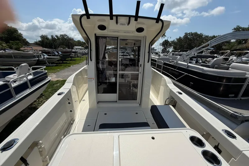 Slide: The Image of 2025 Bayliner Trophy T23 Pilothouse boat with spacious deck and modern design. - 52