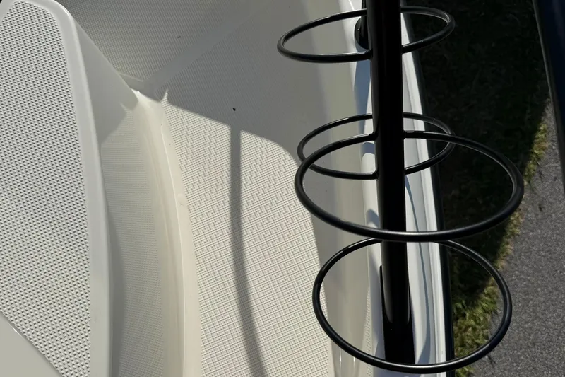 Slide: The Image of 2025 Bayliner Trophy T23 Pilothouse deck with rod holder detail. - 9