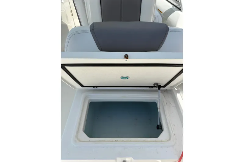 Slide: The Image of Open storage compartment on a 2018 World Cat 255 DC boat. - 15